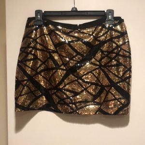Black and gold sequined mini skirt